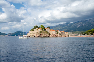 Fototapeta na wymiar view from the sea to the island of Sveti Stefan in Montenegro