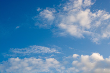 Fototapeta premium air,background,beautiful,beauty,blue,clear,climate,cloud,clouds,cloudscape,cloudy,color,cumulus,day,high,light,nature,outdoor,scenic,sky,summer,sunlight,sunny,weather,white
