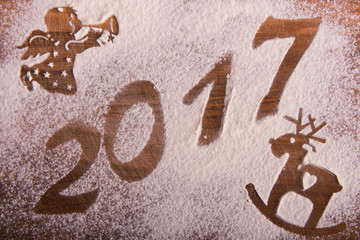 2017 inscription of flour on wooden Board