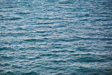 Blue sea, light waves, water surface