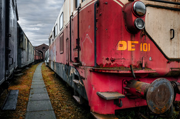 Rusty locomotive in the station of Turin Ponte Mosca (Italy), repair workshop for old trains