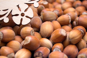 Many peeled hazel nuts - background of nature