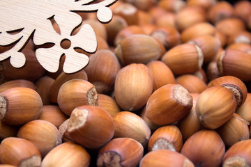 Many peeled hazel nuts - background of nature