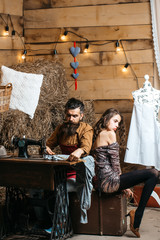 Tailor man and pretty girl