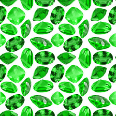 seamless background from isolated emerald gems