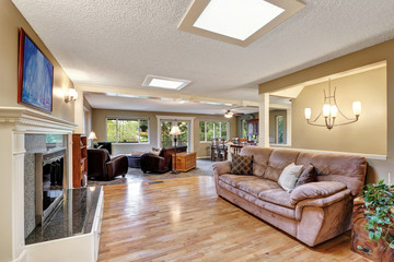 Open plan family room with hardwood floor