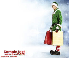 Winter time and elf with gifts 