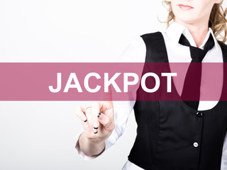 jeckpot written on virtual screen. technology, internet and networking concept. woman in a black business shirt presses button on virtual screens