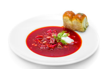 Ukrainian borsch isolated in a white plate