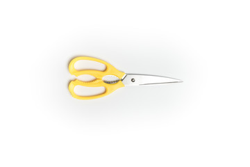 Yellow scissor isolated on white background