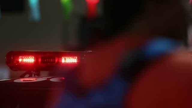 flashing sirens of police car in downtown