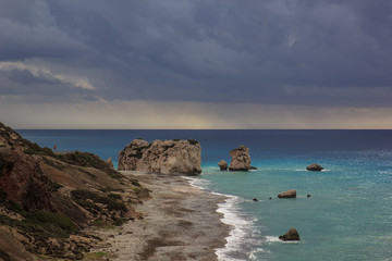 Fototapeta na wymiar Aphrodite's rock in Autumn before the storm, Cyprus 