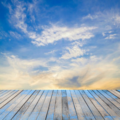 Naklejka na ściany i meble perspective wood plank floor on sunset sky 