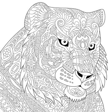 Stylized tiger (lion, wildcat), isolated on white background. Freehand sketch for adult anti stress coloring book page with doodle and zentangle elements.