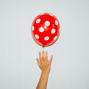 polka dot red/white balloon- direct flash used for contemporary trend