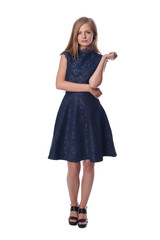 Fototapeta premium Young pretty long haired blonde woman posing in fashion dress on white background in a studio. Spring summer photo, catalog collection.