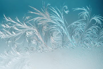 Winter background, frost on window