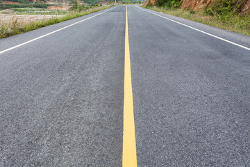 Fototapeta na wymiar asphalt road with yellow line.