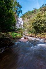 Waterfall in deep forest in national park in Thailand.
