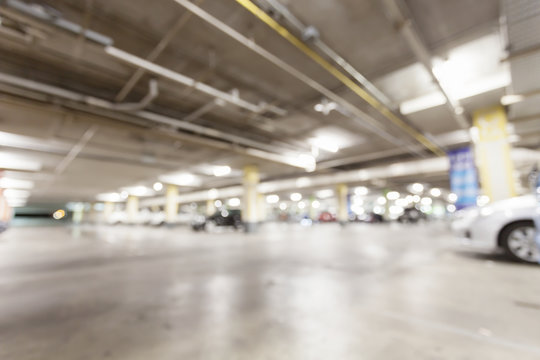 Blurred image, Parking garage  interior underground parking with