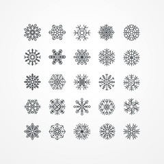 Collection of black snowflakes on a white background