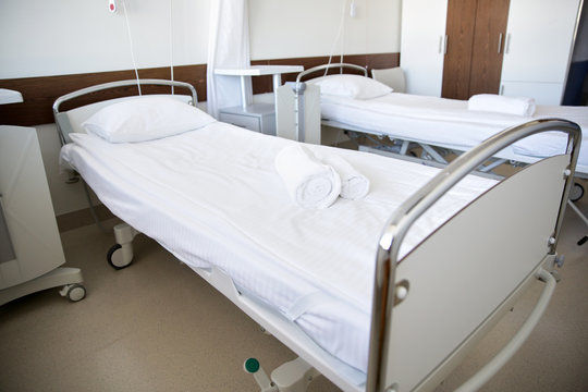 hospital ward with clean empty beds