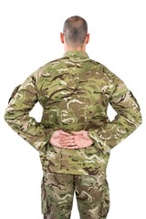 Rear view od soldier standing with his hands behind back