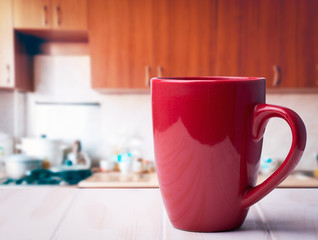 Red cup on the kitchen table