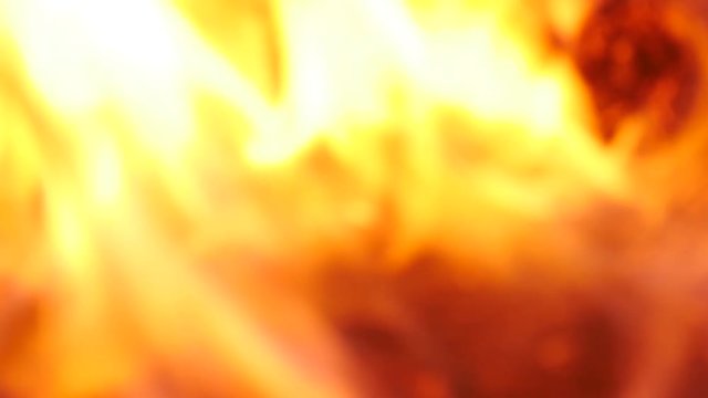 Defocused Burning hot ahes in flame