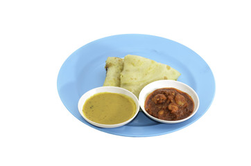 Two slices of homemade plain pancake with curry and shrimp gravy or sambal udang on cyan plate on white background