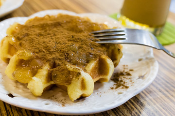 Fresh Belgian liege waffle with apple and cinammon
