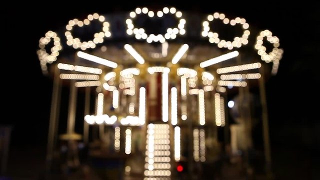 County fair fairground merry-go-round at night