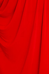 folds of red material as background