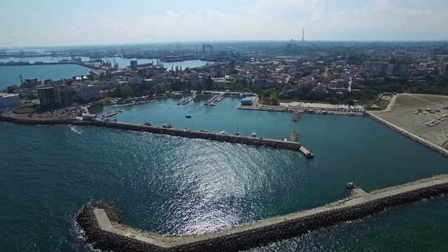 Flight over Constanta coastline to industrial harbour, Romania