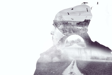 double exposure of young thinking man with nature and birds isolated in front of white background