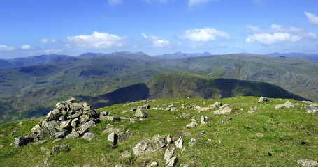 Fototapeta na wymiar Stone Cairn on the summit