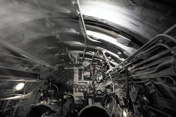 Detailed view of valves and pipes in old submarine