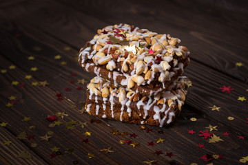 piece of cake, cookies with nuts and white icing, Christmas star