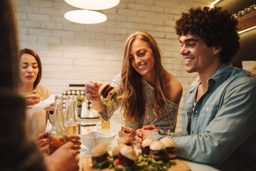 Enjoying burgers with friends