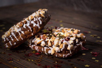 piece of cake, cookies with nuts and white icing, Christmas star