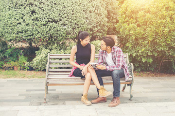 Young hipster couple teenagers in love in the city, Summer holid