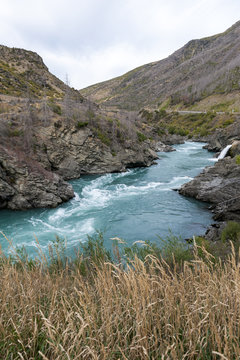 The Roaring Meg (Te Wai a Korokio) the turbulent stream that both drives this hydro electric power station and merges with the Kawarau River, Central Otago, south island of New Zealand