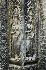 ancient asian stone carved figures in angkor wat temple cambodia