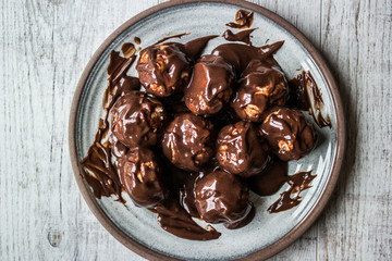 Profiteroles with chocolate cream.