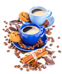 Cup of coffee and beans with delicious macaroon on a white backg