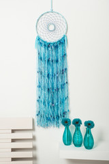 Dream catcher with blue threads