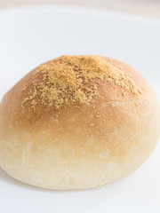 Homemade dinner roll on white isolated background