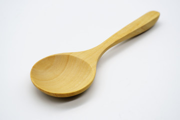 Close-up  wooden spoon isolated on white background