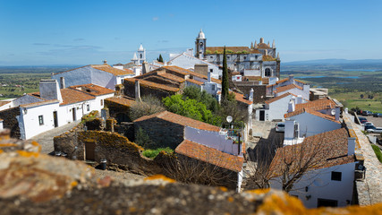 Cityscape of Monsaraz, Portugal, against blue sky