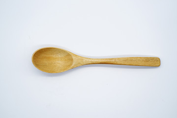 Close-up  wooden spoon isolated on white background